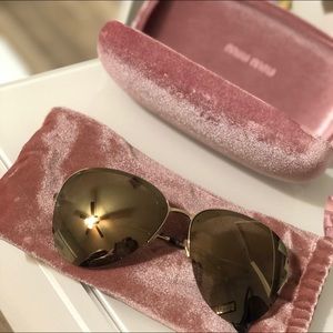 MIU MIU reflective aviator sunglasses